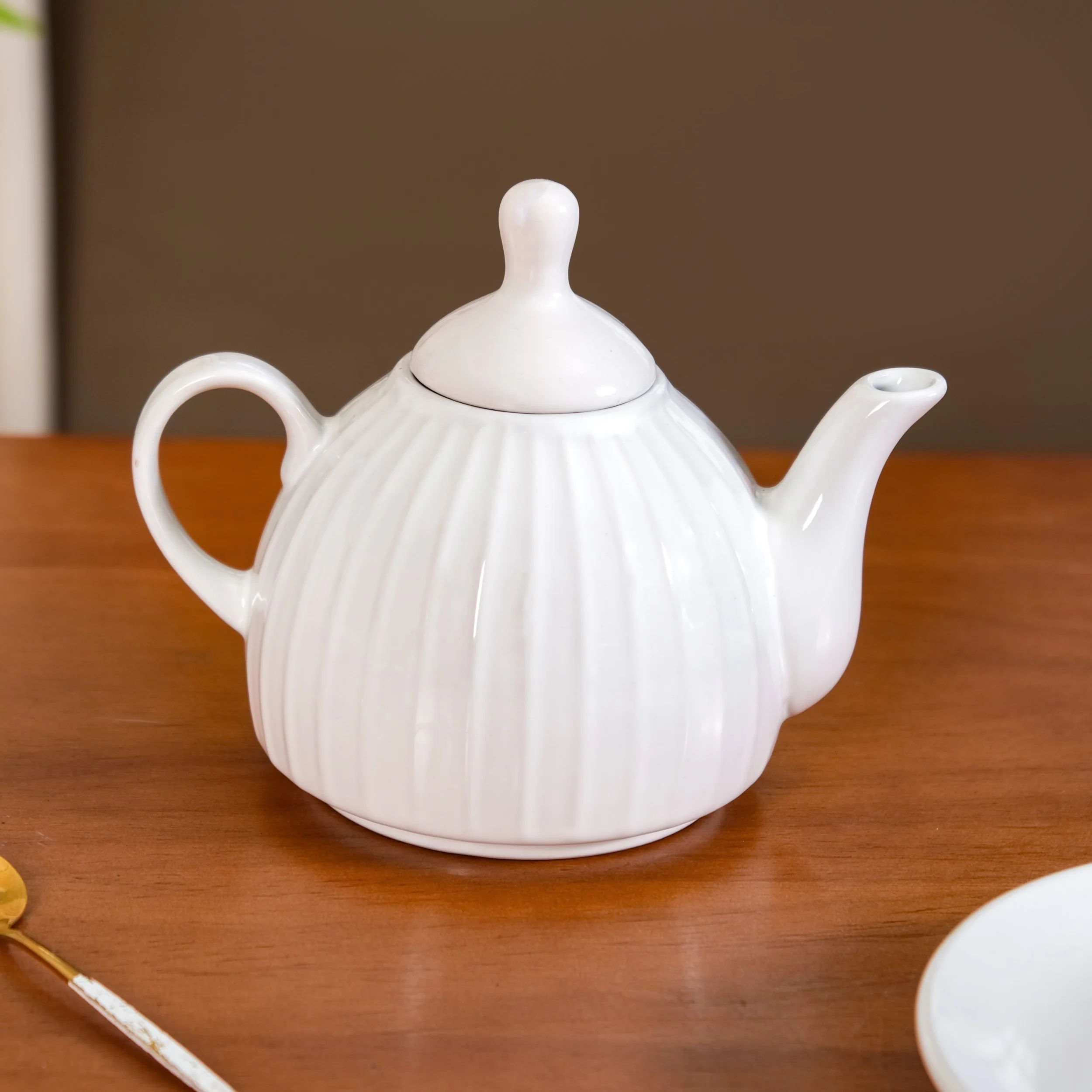 Ambrosia White Ceramic Teapot With Cup And Saucer - Image 7