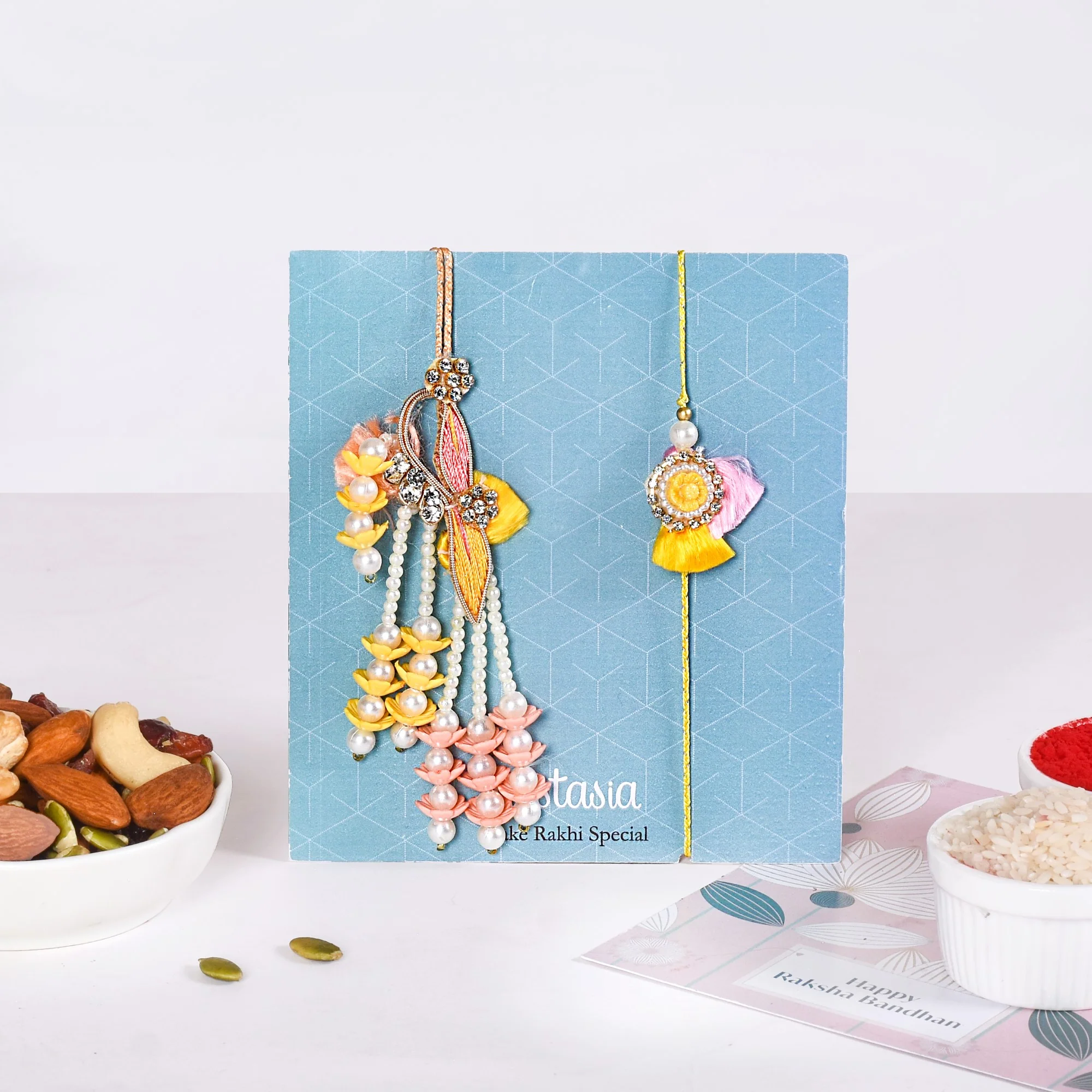 Divine Swastika Rakhi Hamper For Bhaiya Bhabhi - Image 2