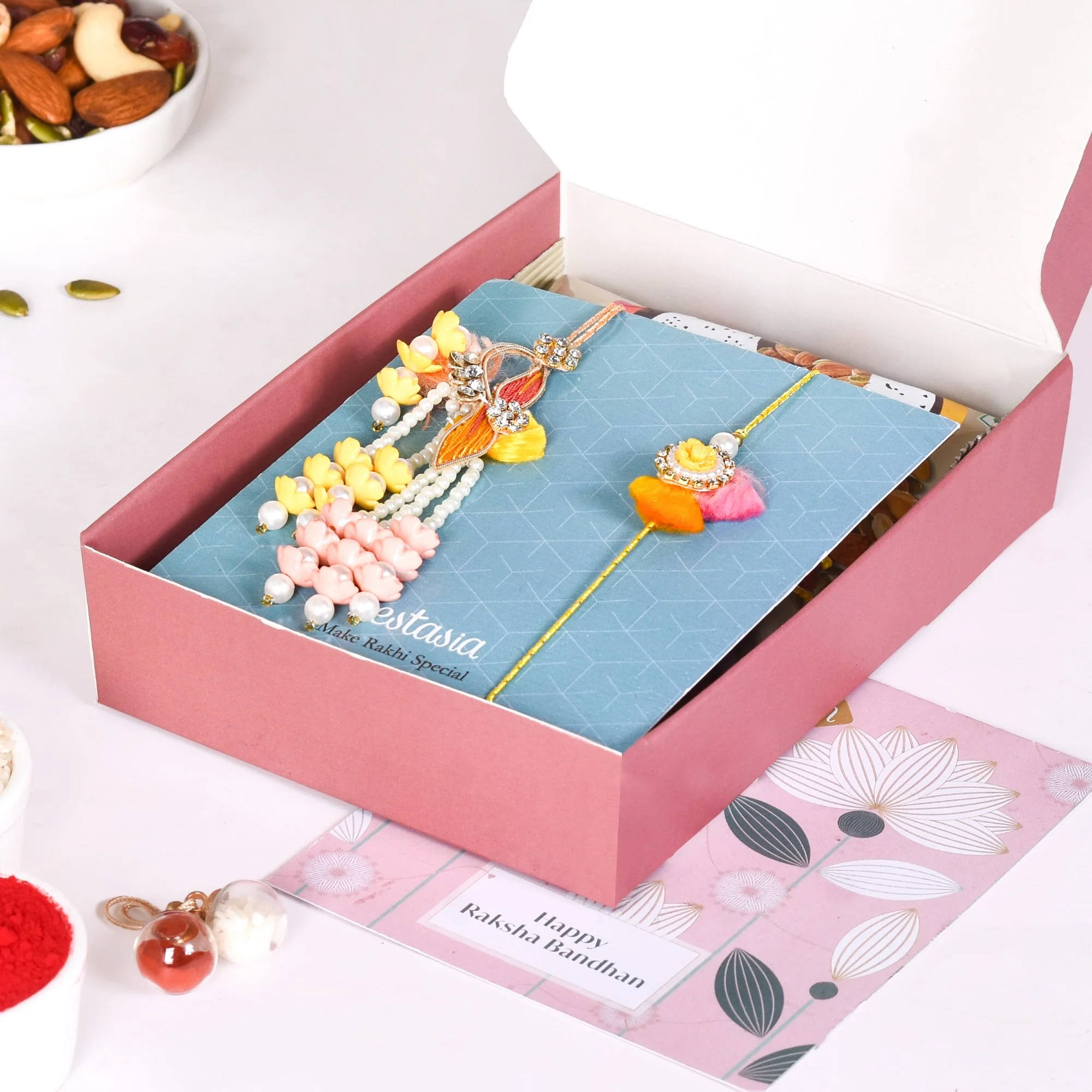 Divine Swastika Rakhi Hamper For Bhaiya Bhabhi - Image 4