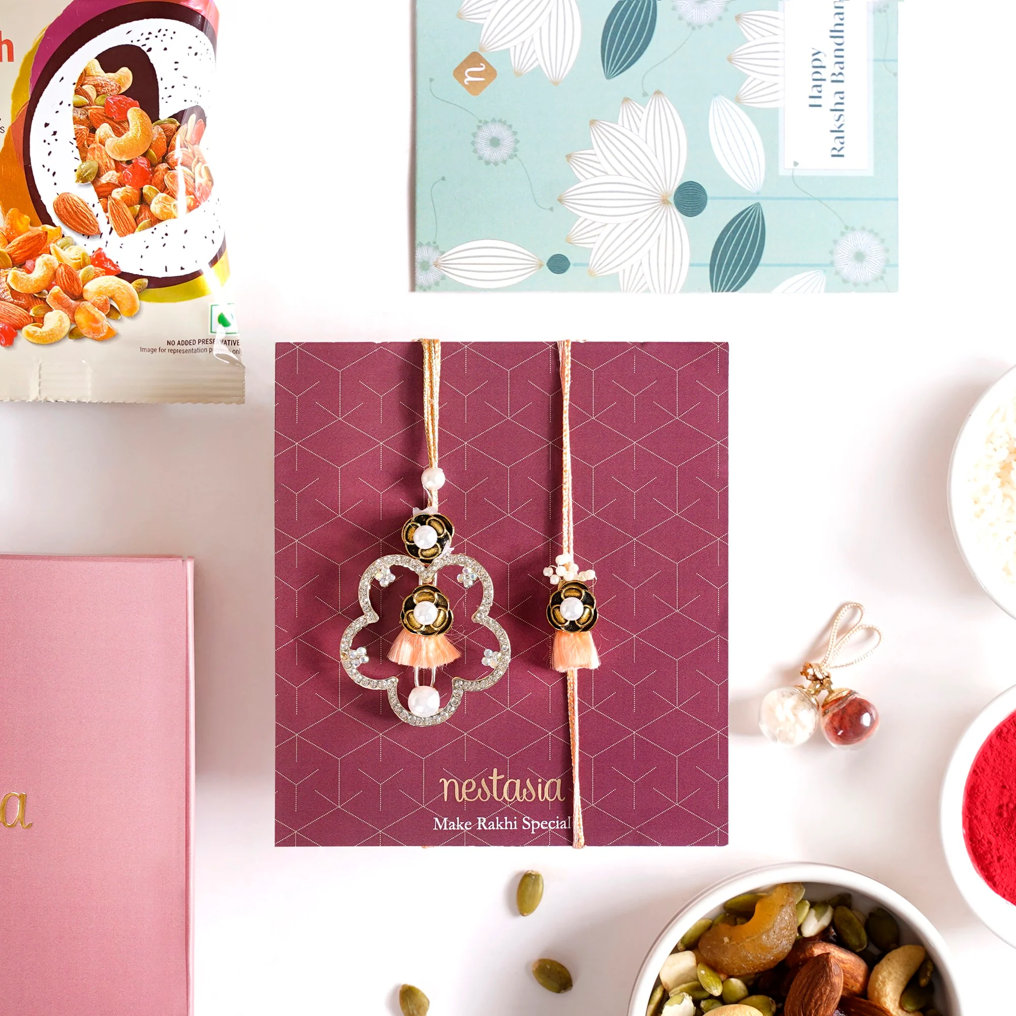 Peach Crystal Studded Pair Rakhi Gift Set Of 4 With Dry Fruits - Image 3